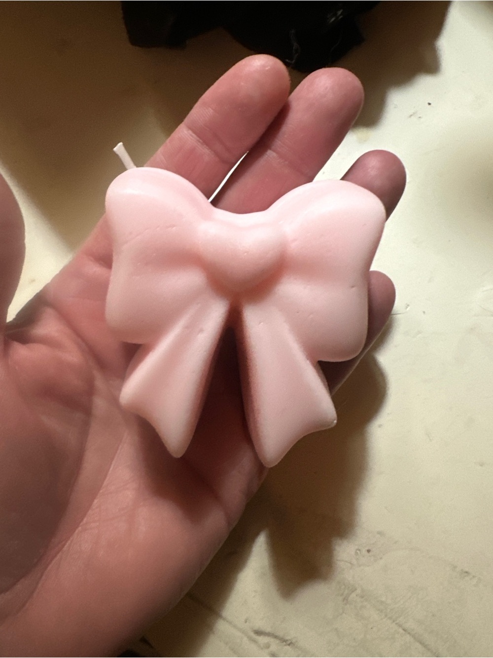 Pink bow candle